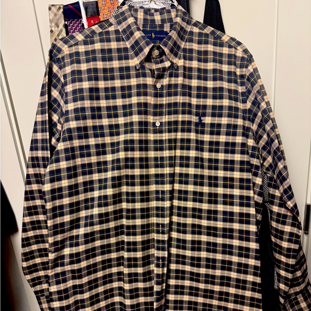 Polo Shirt in like new condition.  Plaid pattern very nice shirt.